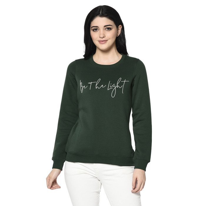 A woman wearing a Bottle Green Sweatshirt with round neck and ribbed cuff designed for mild winter.